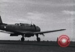 Image of SB2U landing on CV-7 USS Wasp Pacific Theater, 1942, second 28 stock footage video 65675027784