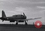 Image of SB2U landing on CV-7 USS Wasp Pacific Theater, 1942, second 29 stock footage video 65675027784