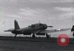 Image of SB2U landing on CV-7 USS Wasp Pacific Theater, 1942, second 32 stock footage video 65675027784