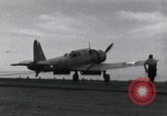 Image of SB2U landing on CV-7 USS Wasp Pacific Theater, 1942, second 33 stock footage video 65675027784