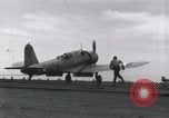 Image of SB2U landing on CV-7 USS Wasp Pacific Theater, 1942, second 35 stock footage video 65675027784
