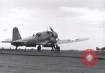Image of SB2U landing on CV-7 USS Wasp Pacific Theater, 1942, second 37 stock footage video 65675027784