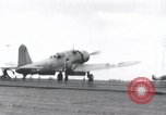 Image of SB2U landing on CV-7 USS Wasp Pacific Theater, 1942, second 38 stock footage video 65675027784