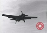Image of F4F landing on USS Wasp Pacific Theater, 1942, second 10 stock footage video 65675027785