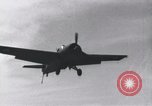 Image of F4F landing on USS Wasp Pacific Theater, 1942, second 11 stock footage video 65675027785