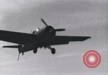 Image of F4F landing on USS Wasp Pacific Theater, 1942, second 12 stock footage video 65675027785