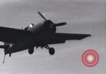 Image of F4F landing on USS Wasp Pacific Theater, 1942, second 13 stock footage video 65675027785
