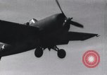 Image of F4F landing on USS Wasp Pacific Theater, 1942, second 14 stock footage video 65675027785