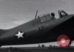 Image of F4F landing on USS Wasp Pacific Theater, 1942, second 17 stock footage video 65675027785