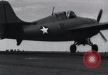 Image of F4F landing on USS Wasp Pacific Theater, 1942, second 19 stock footage video 65675027785