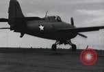 Image of F4F landing on USS Wasp Pacific Theater, 1942, second 20 stock footage video 65675027785