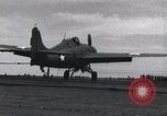 Image of F4F landing on USS Wasp Pacific Theater, 1942, second 22 stock footage video 65675027785