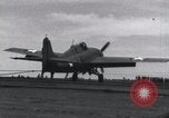 Image of F4F landing on USS Wasp Pacific Theater, 1942, second 23 stock footage video 65675027785