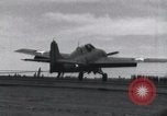 Image of F4F landing on USS Wasp Pacific Theater, 1942, second 24 stock footage video 65675027785