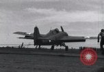 Image of F4F landing on USS Wasp Pacific Theater, 1942, second 25 stock footage video 65675027785