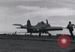 Image of F4F landing on USS Wasp Pacific Theater, 1942, second 26 stock footage video 65675027785
