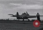 Image of F4F landing on USS Wasp Pacific Theater, 1942, second 27 stock footage video 65675027785