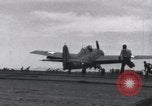 Image of F4F landing on USS Wasp Pacific Theater, 1942, second 28 stock footage video 65675027785