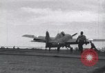 Image of F4F landing on USS Wasp Pacific Theater, 1942, second 29 stock footage video 65675027785