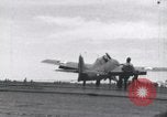 Image of F4F landing on USS Wasp Pacific Theater, 1942, second 30 stock footage video 65675027785