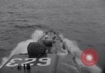 Image of Convoy of U.S. warships for invasion of Sicily Atlantic Ocean, 1943, second 41 stock footage video 65675027915