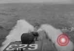Image of Convoy of U.S. warships for invasion of Sicily Atlantic Ocean, 1943, second 55 stock footage video 65675027915