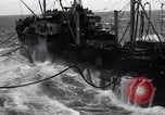 Image of fueling of ship Pacific Ocean, 1945, second 7 stock footage video 65675027917