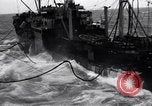 Image of fueling of ship Pacific Ocean, 1945, second 8 stock footage video 65675027917