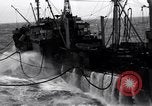 Image of fueling of ship Pacific Ocean, 1945, second 11 stock footage video 65675027917
