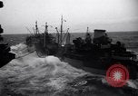 Image of fueling of ship Pacific Ocean, 1945, second 16 stock footage video 65675027917