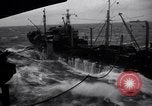 Image of fueling of ship Pacific Ocean, 1945, second 26 stock footage video 65675027917