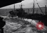Image of fueling of ship Pacific Ocean, 1945, second 28 stock footage video 65675027917