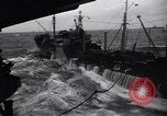 Image of fueling of ship Pacific Ocean, 1945, second 30 stock footage video 65675027917