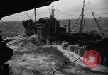 Image of fueling of ship Pacific Ocean, 1945, second 31 stock footage video 65675027917