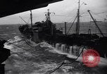 Image of fueling of ship Pacific Ocean, 1945, second 34 stock footage video 65675027917