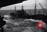 Image of fueling of ship Pacific Ocean, 1945, second 36 stock footage video 65675027917