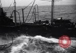 Image of fueling of ship Pacific Ocean, 1945, second 44 stock footage video 65675027917