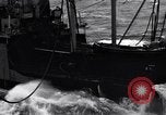 Image of fueling of ship Pacific Ocean, 1945, second 51 stock footage video 65675027917