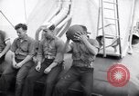 Image of Sailors are issued combat helmets aboard the USS Nelson  Atlantic Ocean, 1943, second 19 stock footage video 65675027935