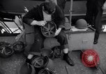 Image of Sailors are issued combat helmets aboard the USS Nelson  Atlantic Ocean, 1943, second 23 stock footage video 65675027935
