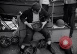 Image of Sailors are issued combat helmets aboard the USS Nelson  Atlantic Ocean, 1943, second 24 stock footage video 65675027935