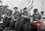 Image of Sailors are issued combat helmets aboard the USS Nelson  Atlantic Ocean, 1943, second 26 stock footage video 65675027935