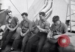 Image of Sailors are issued combat helmets aboard the USS Nelson  Atlantic Ocean, 1943, second 27 stock footage video 65675027935