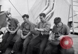 Image of Sailors are issued combat helmets aboard the USS Nelson  Atlantic Ocean, 1943, second 28 stock footage video 65675027935