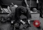 Image of Sailors are issued combat helmets aboard the USS Nelson  Atlantic Ocean, 1943, second 33 stock footage video 65675027935
