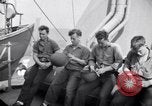 Image of Sailors are issued combat helmets aboard the USS Nelson  Atlantic Ocean, 1943, second 39 stock footage video 65675027935