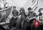 Image of Sailors are issued combat helmets aboard the USS Nelson  Atlantic Ocean, 1943, second 42 stock footage video 65675027935