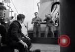 Image of Sailors are issued combat helmets aboard the USS Nelson  Atlantic Ocean, 1943, second 47 stock footage video 65675027935