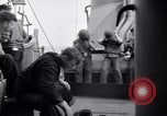 Image of Sailors are issued combat helmets aboard the USS Nelson  Atlantic Ocean, 1943, second 48 stock footage video 65675027935