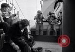 Image of Sailors are issued combat helmets aboard the USS Nelson  Atlantic Ocean, 1943, second 50 stock footage video 65675027935